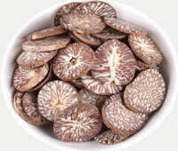 many light brown herb slices of Areca Seed are piled in a plate