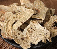 yellow brown dried wild root slices of Largehead Atractylodes Rhizome