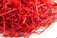 dried reddish herbs of Stigma Croci are piled together
