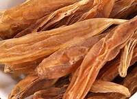 brownish dried herb roots of Asparagus Root are piled together