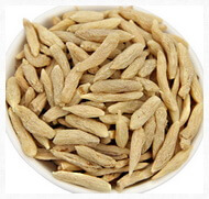 pale brownish dried herb root of Lilyturf root are piled in a plate